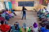 Everlyne Odhiambu, an instructor in the Kibera township in Nairobi, Kenya, demonstrates techniques to escape potential attackers.